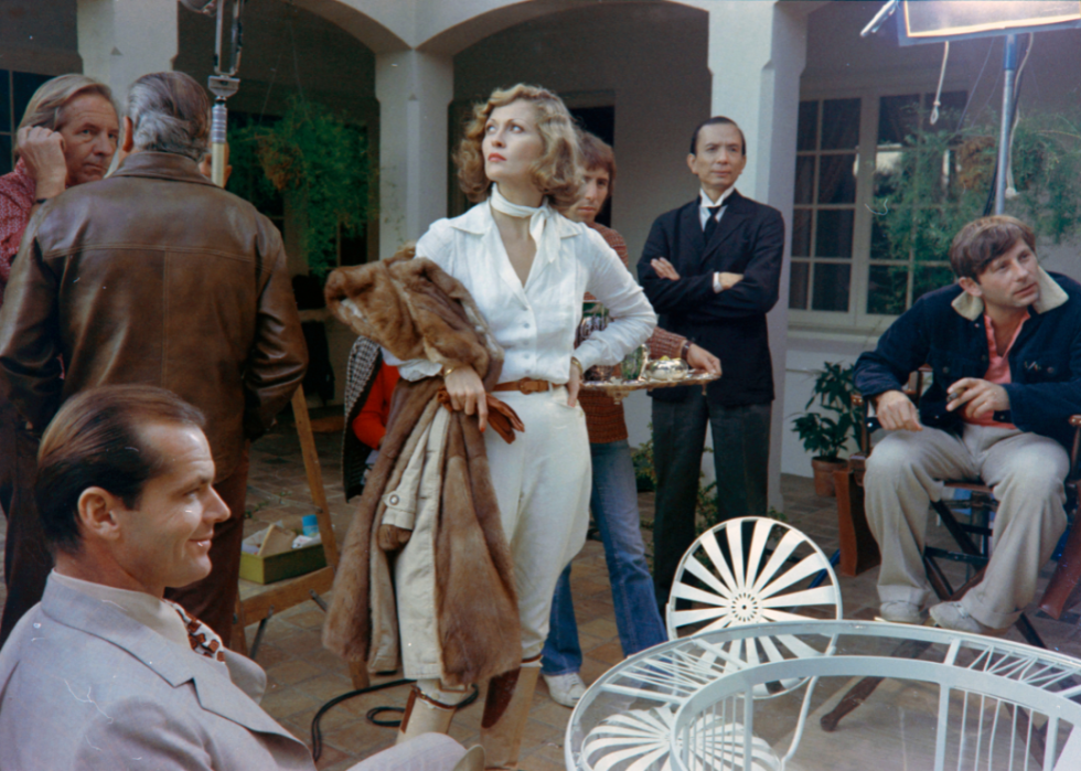 Jack Nicholson, Faye Dunaway, James Hong, and Roman Polanski on the set of ‘Chinatown’.