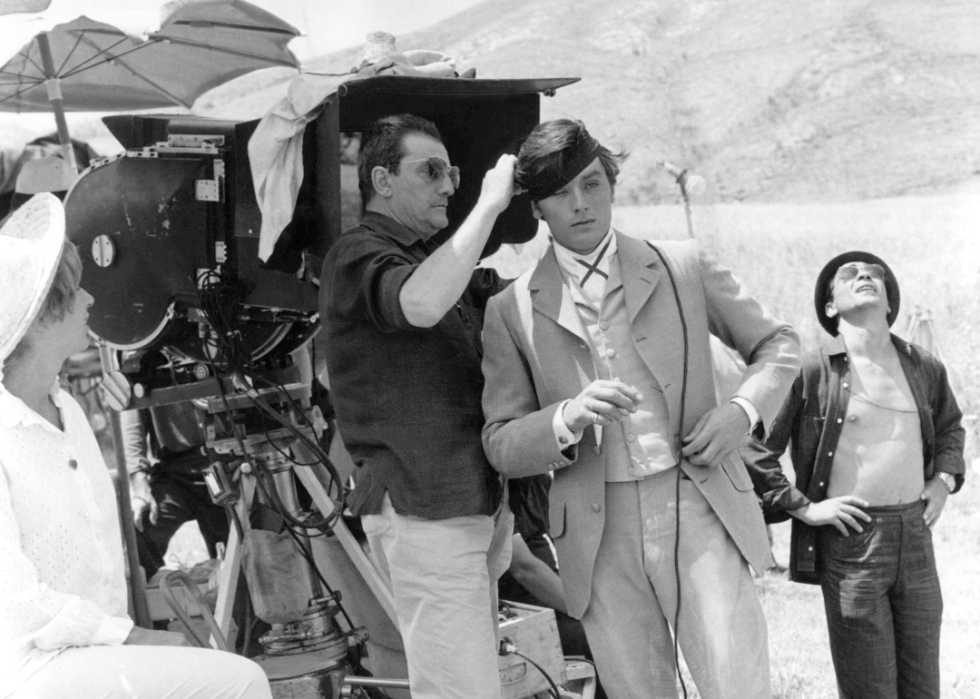 Alain Delon with Luchino Visconti on the set of ‘The Leopard’.