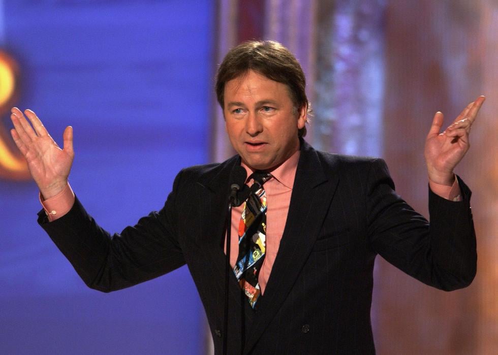 John Ritter gestures onstage.