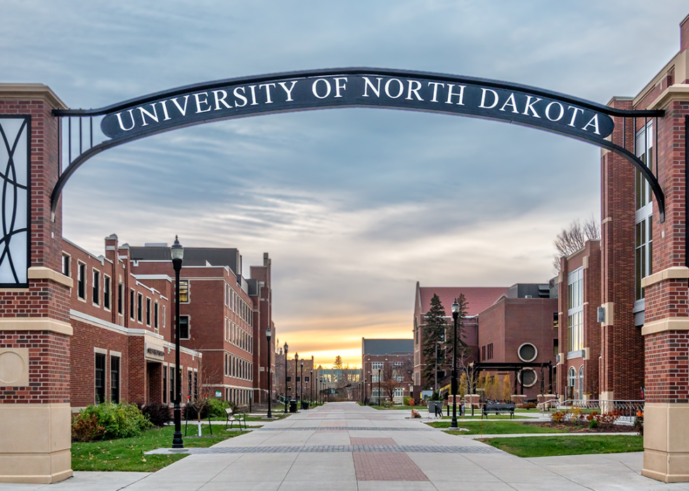 Entrance gate at dusk at the University of North Dakota.