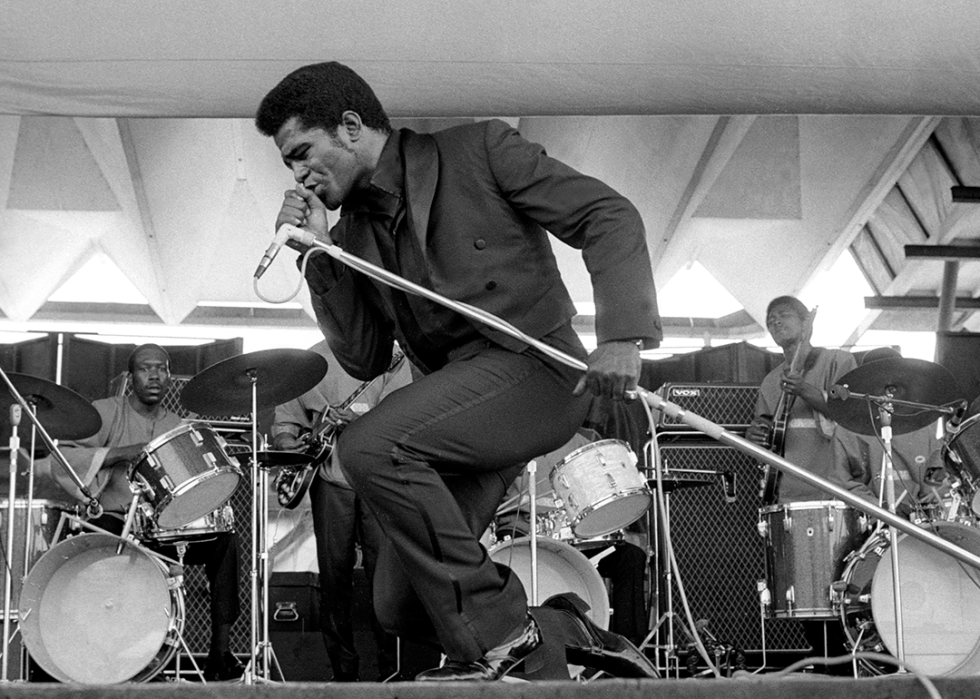 James Brown performs onstage at the Newport Jazz Festival.