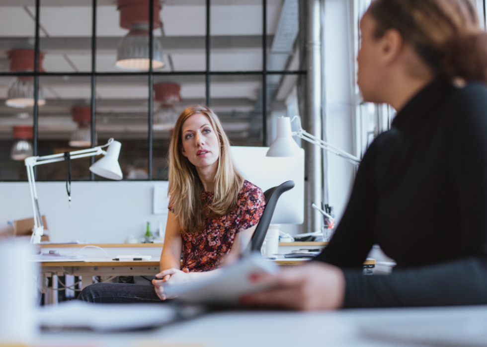 Two women having a meeting in an office.