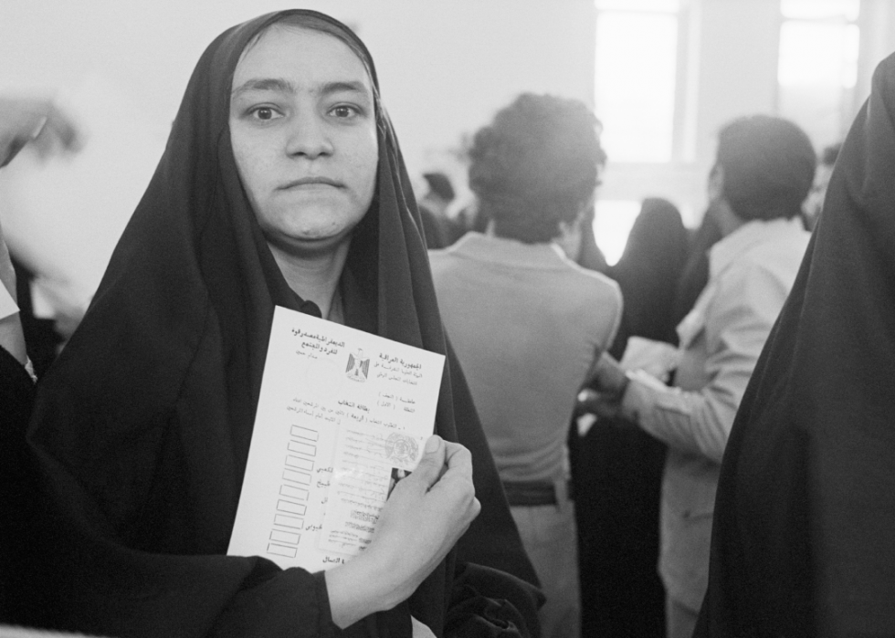 An Iraqi woman votes in 1980