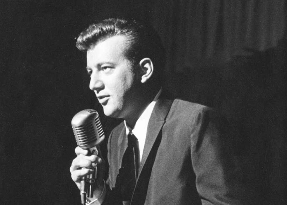 Bobby Darin performing with microphone.