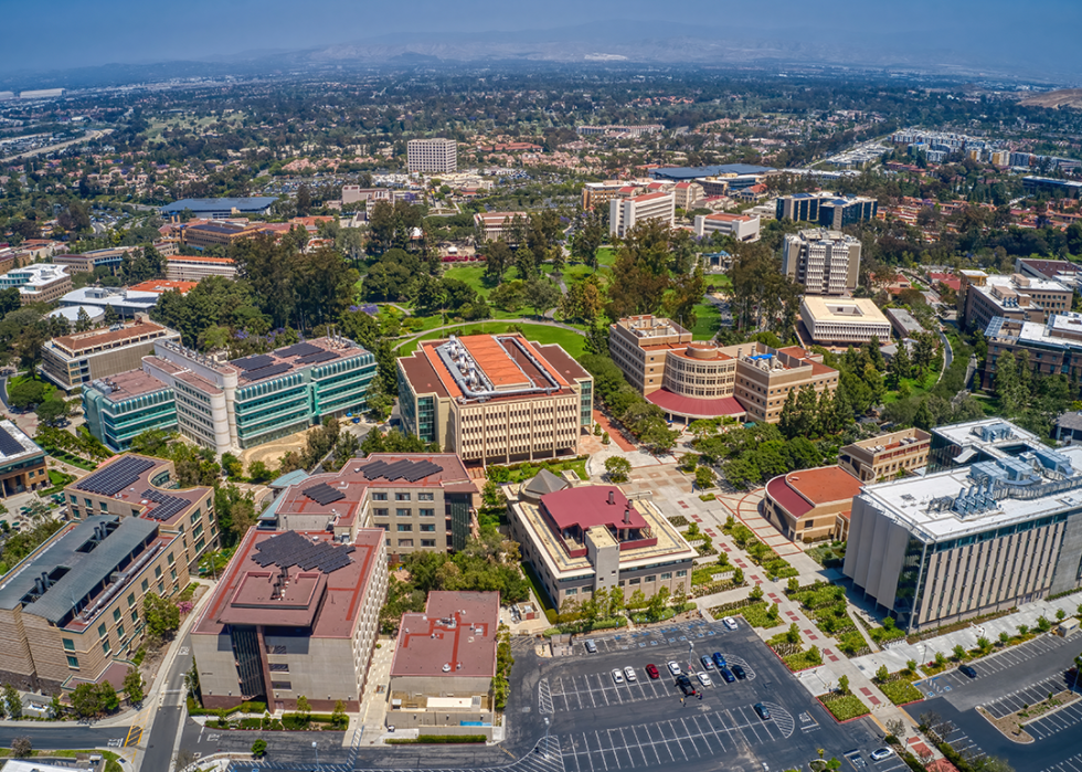 Aerial view of campus and surrounding cityscape.
