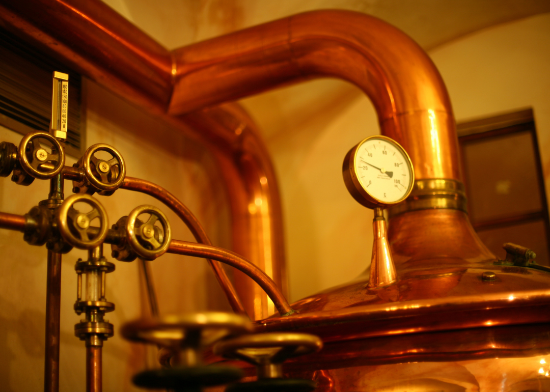 Copper distilling barrels and gauges.
