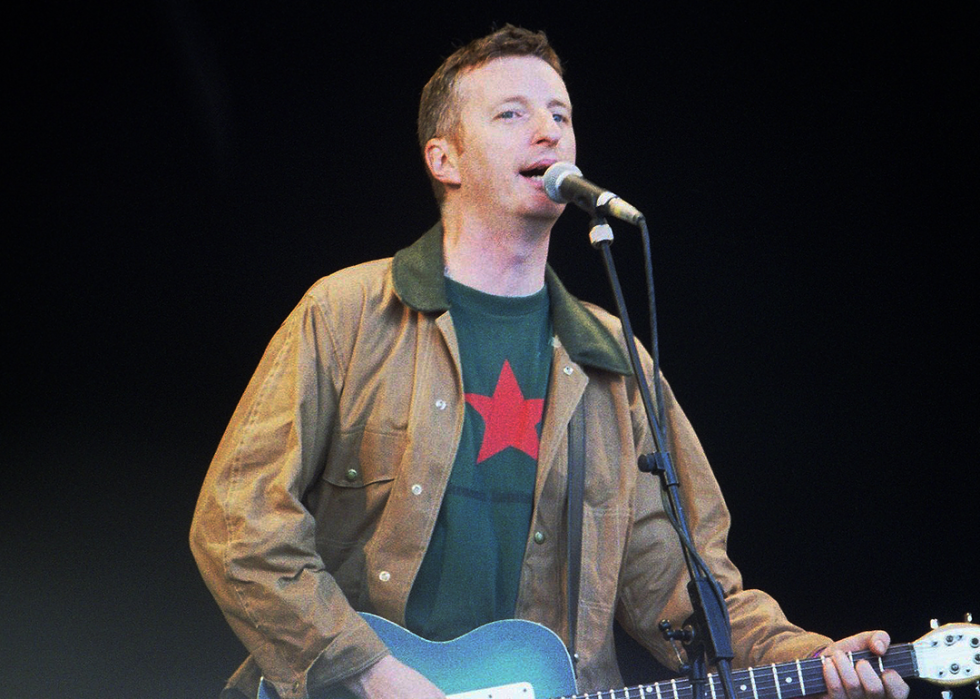 Billy Bragg performs on stage at the Glastonbury Festival.