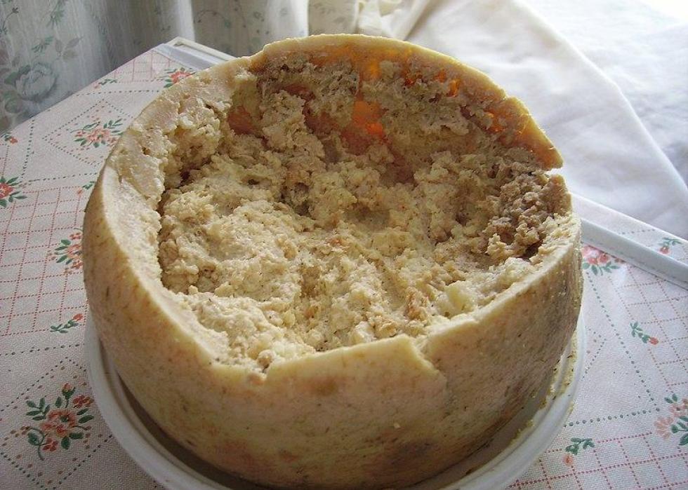 Casu marzu cheese served on a plate.
