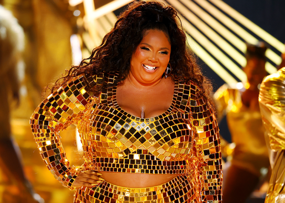 Lizzo performs onstage during the 2022 BET Awards.