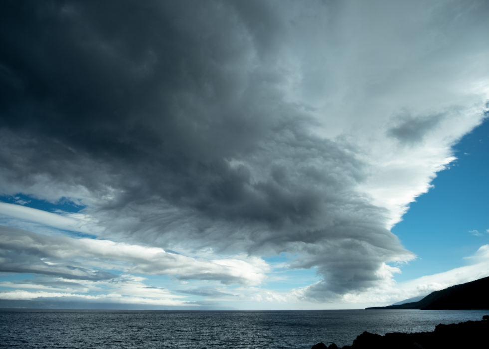 Huge storm clouds over the water.