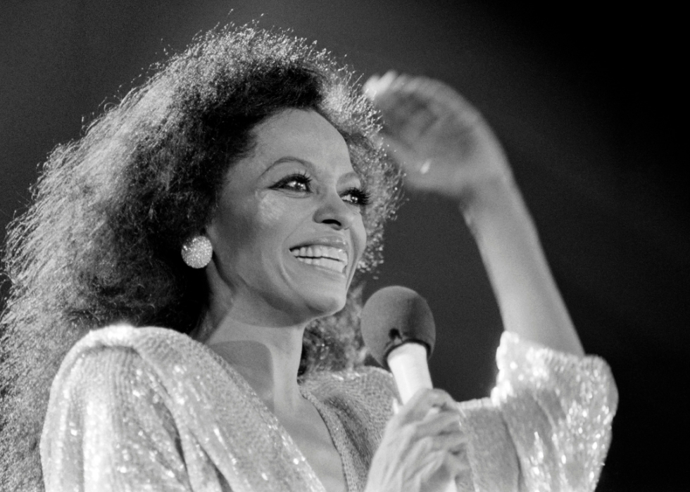 Diana Ross smiles onstage.