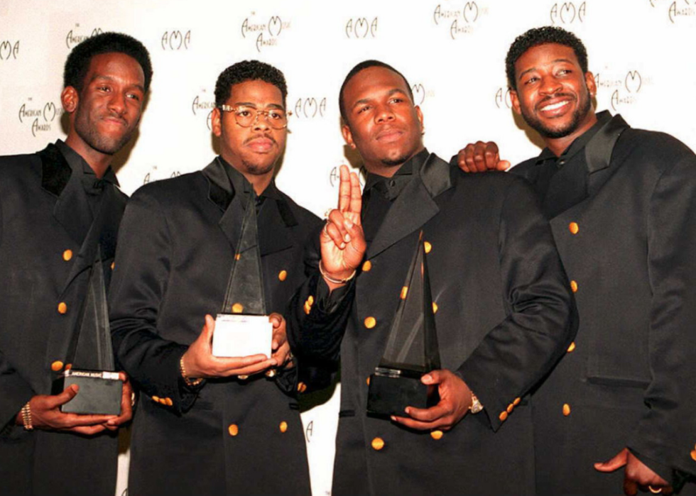 Boyz II Men pose with American Music Award.