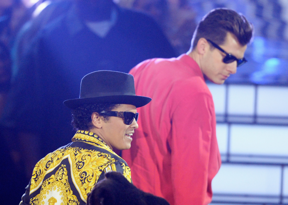 Mark Ronson and Bruno Mars performing onstage.