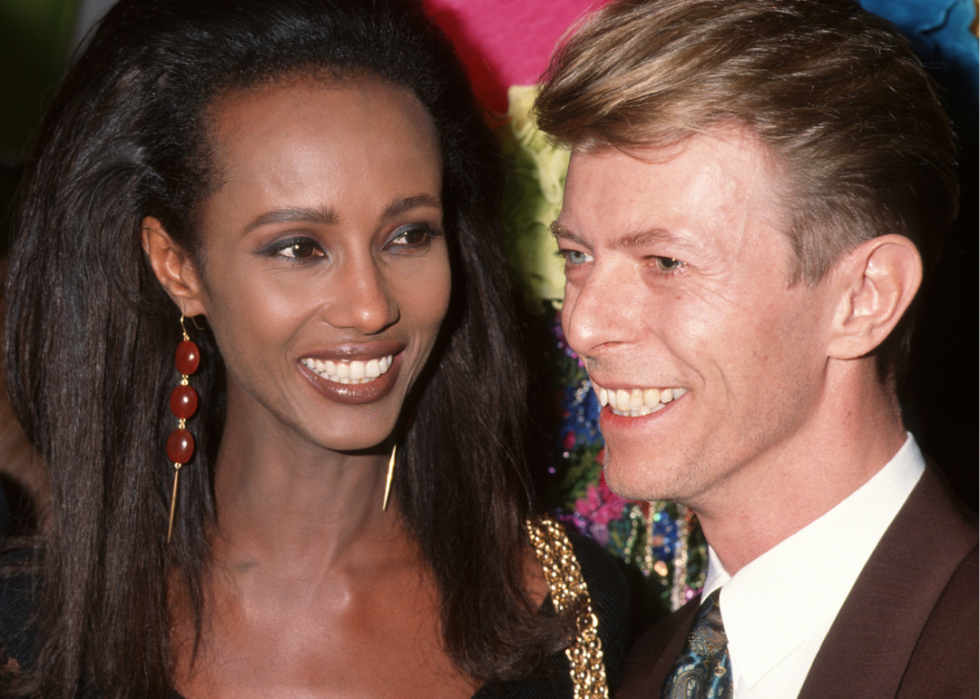 Iman and Bowie smiling.