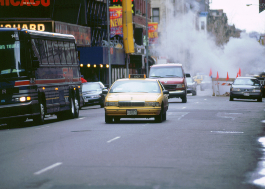 Cars driving through New York in 1994.