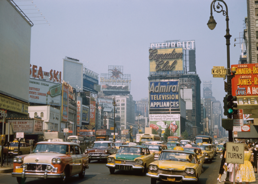 Cars driving in Times Square in 1961.