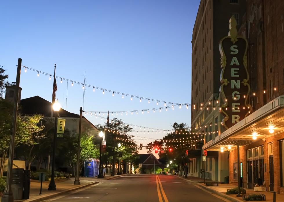 A historic theater with lights in the evening in Hattiesburg, Mississippi.