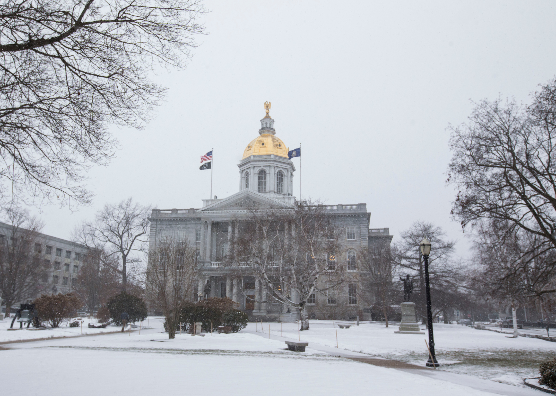 A snowy view of the capitol building in Concord.