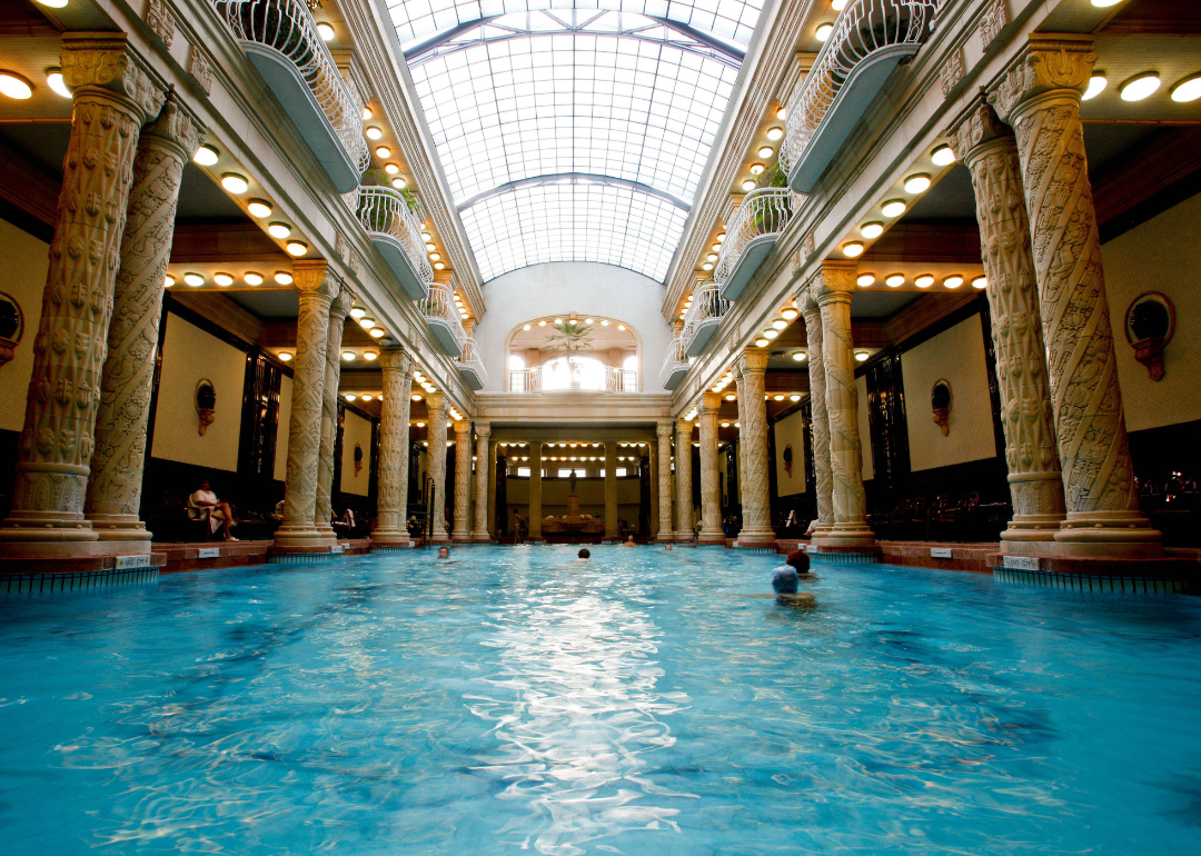 Ornate, indoor swimming pool of the Gellert Baths in Budapest, Hungary.