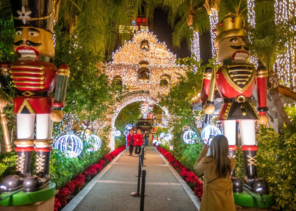 Giant nutcracker decorations on a pathway at the annual Festival of Lights.