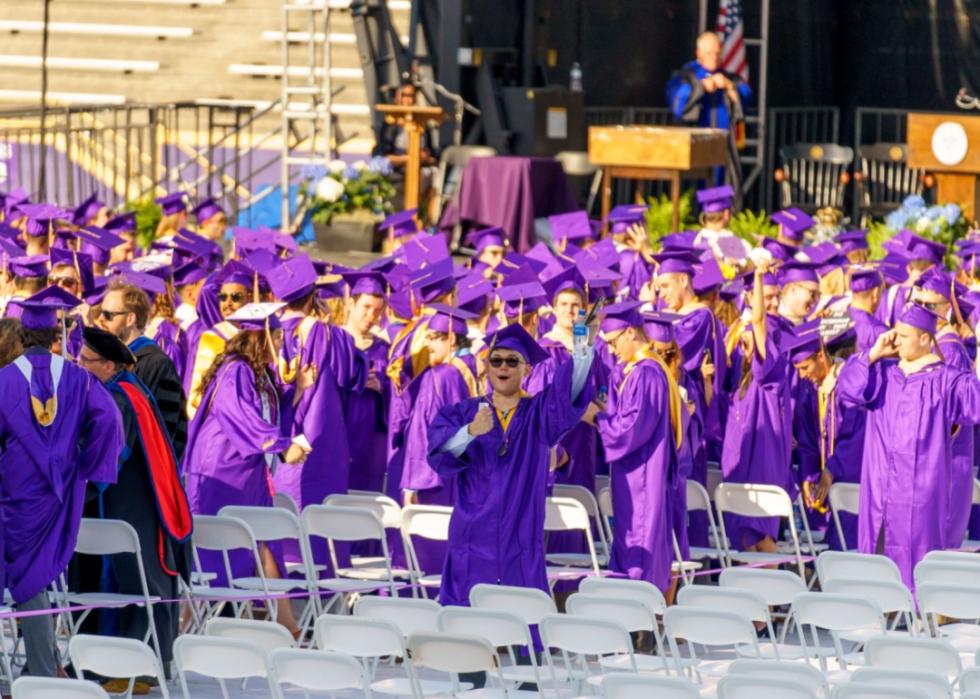 Students celebrating at graduation.
