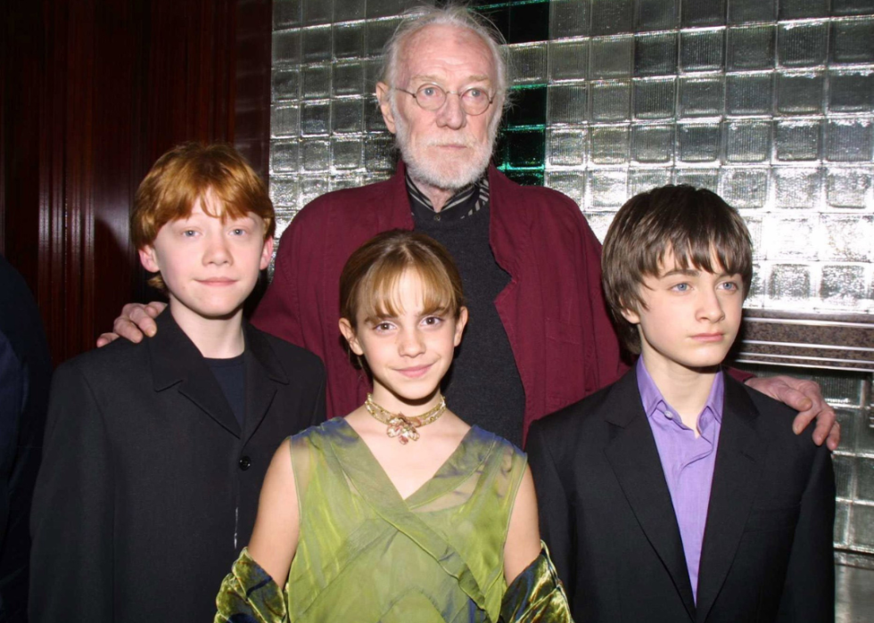 Rupert Grint, Emma Watson, Richard Harris and Daniel Radcliffe at a party after the New York premiere of "Harry Potter and the Sorcerer's Stone."