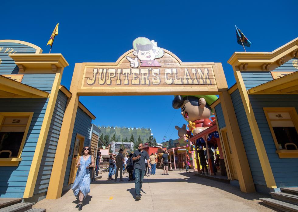 People walking through Jupiter's Claim at Universal Studios.