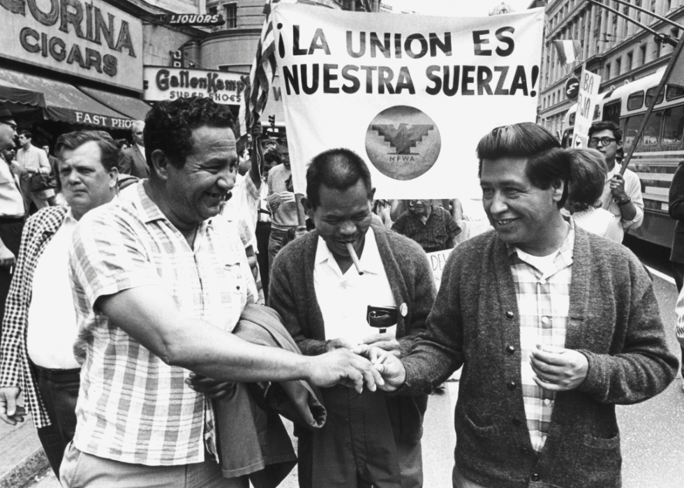 Larry Itliong marches with Cesar Chavez and Julio Hernandez in the Huelga Day March in San Francisco, 1966.