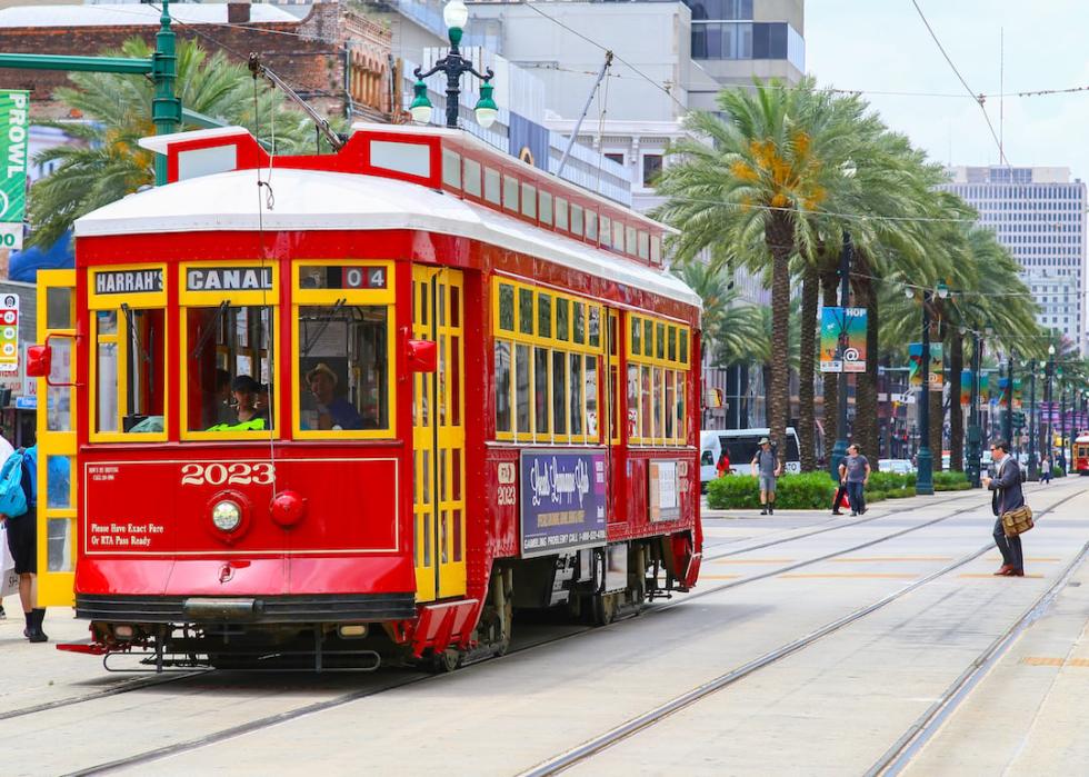 Red streetcar on Canal Street in New Orleans, Louisiana.