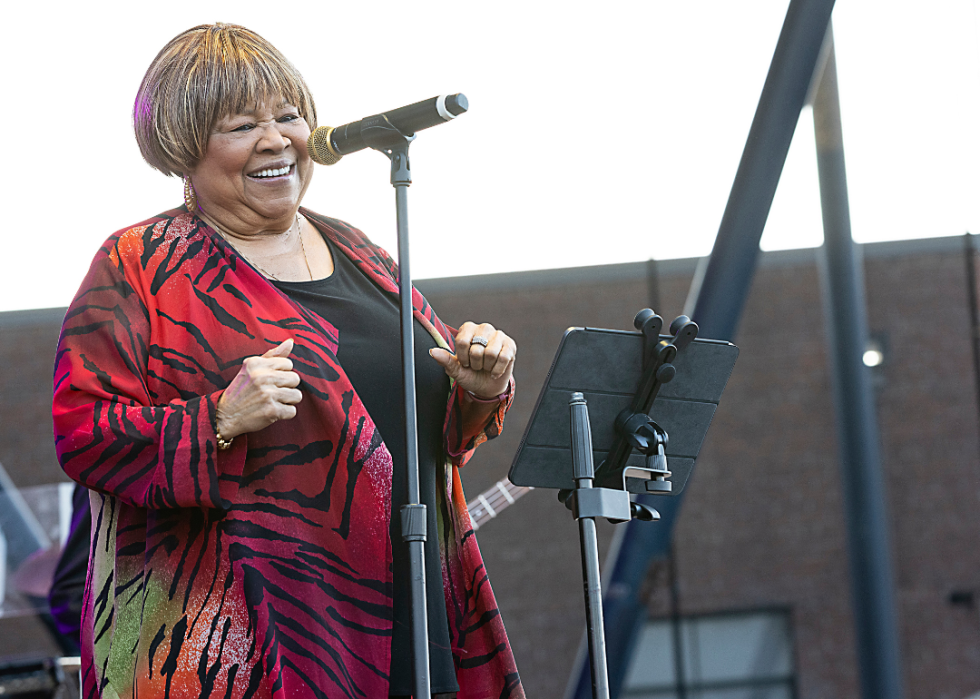 Singer Mavis Staples performs at an outside amphitheatre in 2023 in North Carolina. 