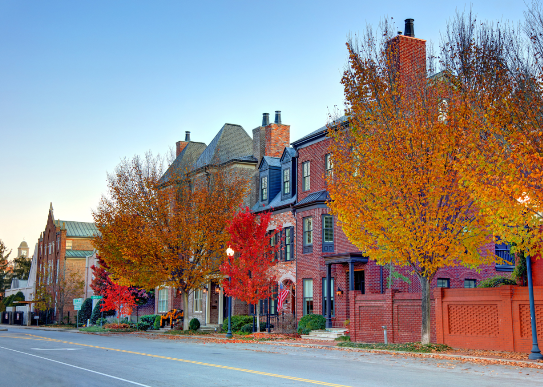 Row houses lined with colorful fall trees in Franklin.