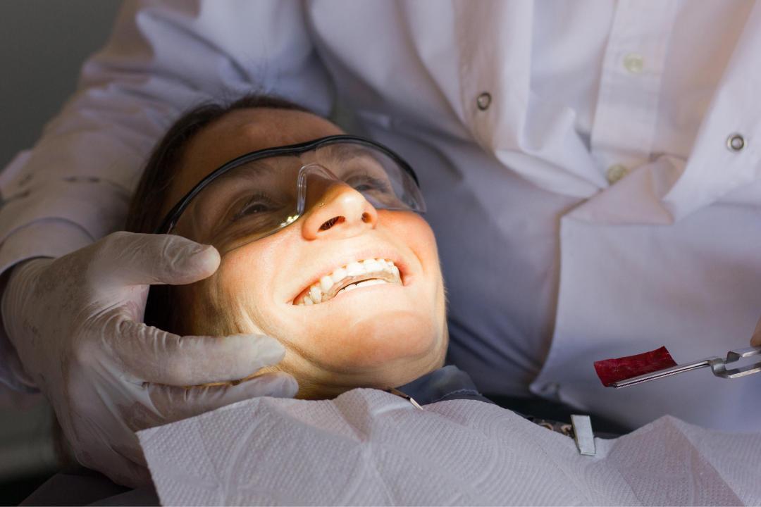 A patient waits for a dental procedure.