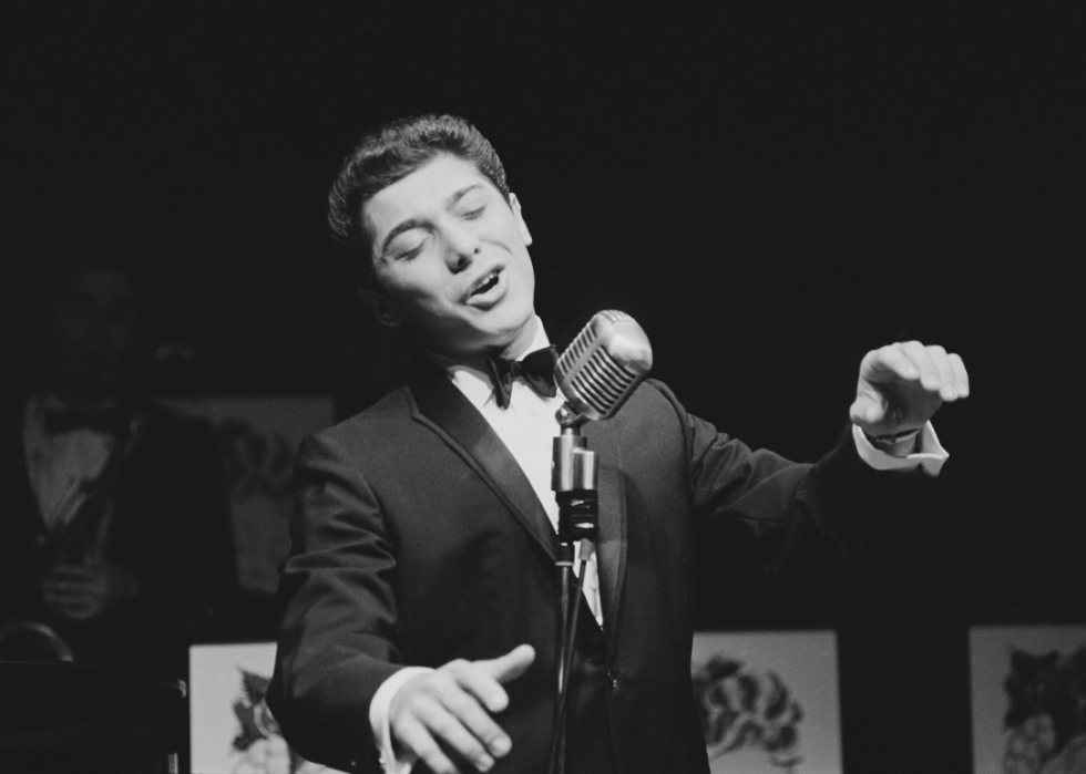 Paul Anka singing onstage.