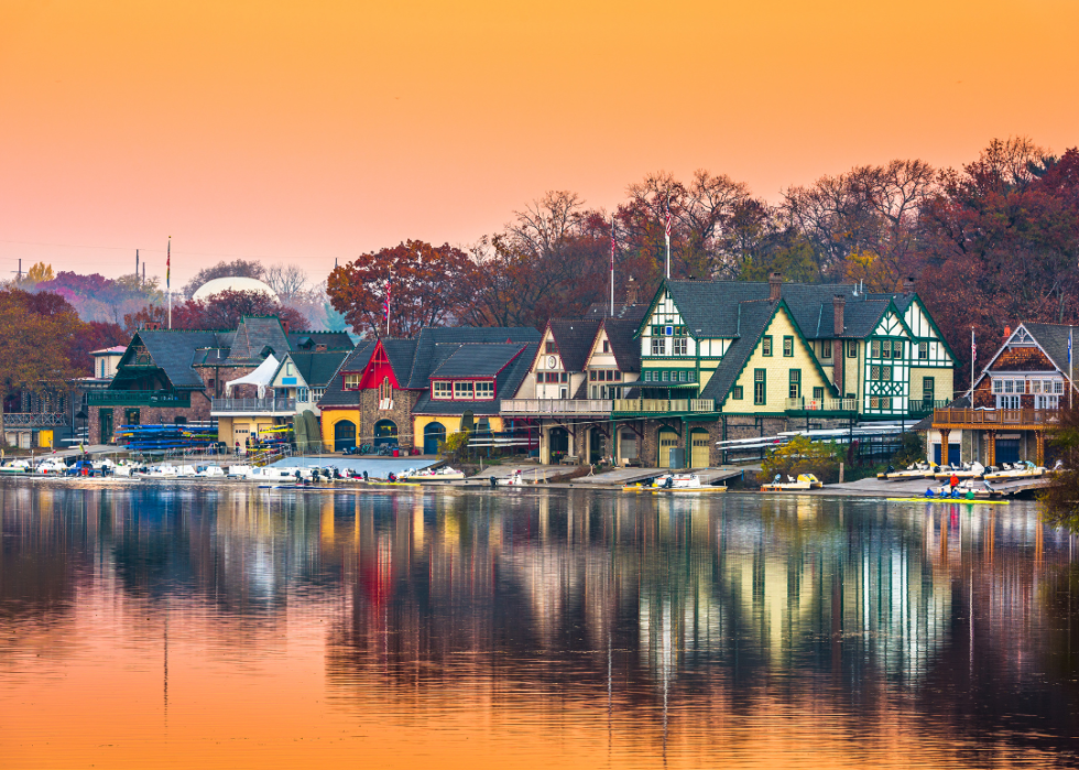 A row of colorful buildings by the water.