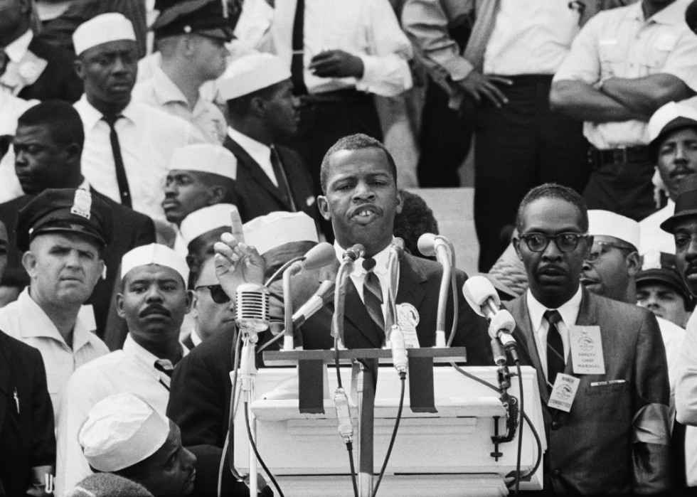 John Lewis, Chairman of the Student Nonviolent Coordinating Committee, speaking at the Lincoln Memorial to participants in the March on Washington.