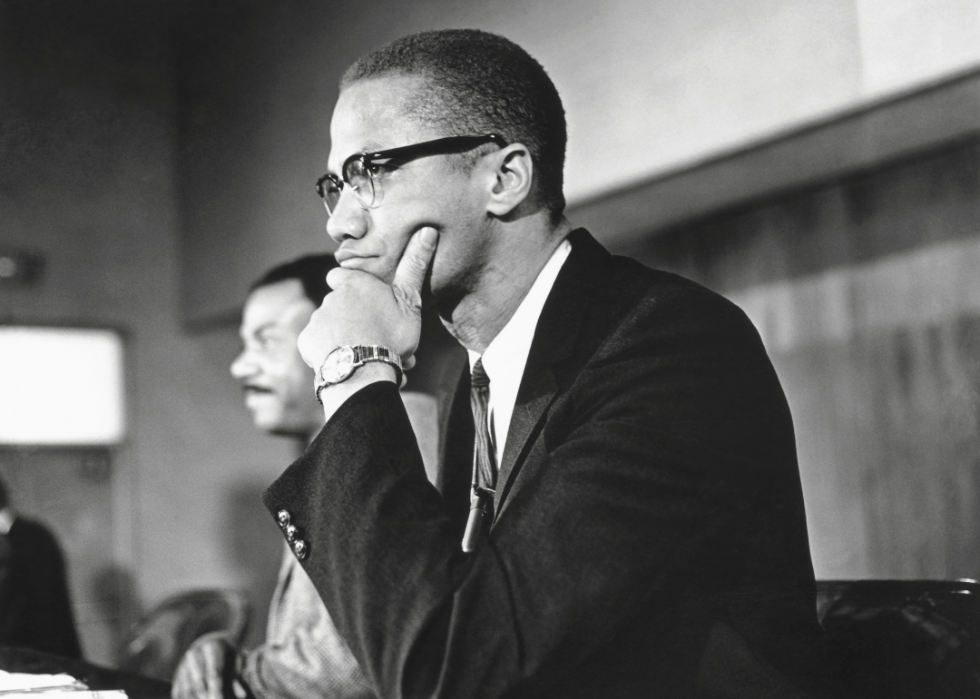 Malcolm X attends a meeting in preparation for a school boycott in Harlem.