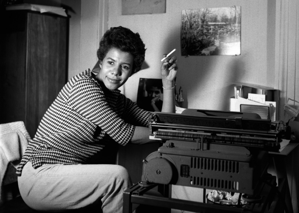 Lorraine Hansberry poses for a portrait in her New York City apartment where she wrote a 'A Raisin in the Sun,' April 1959.