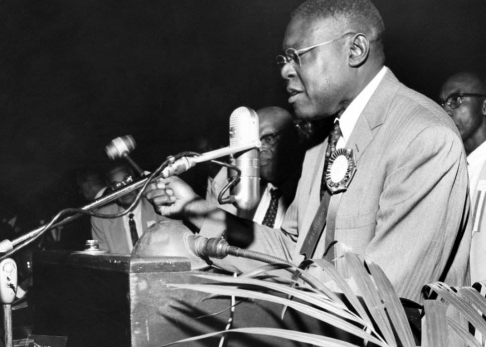 Joseph Jackson speaking at a podium during an election and a National Baptist Convention event, 1960.