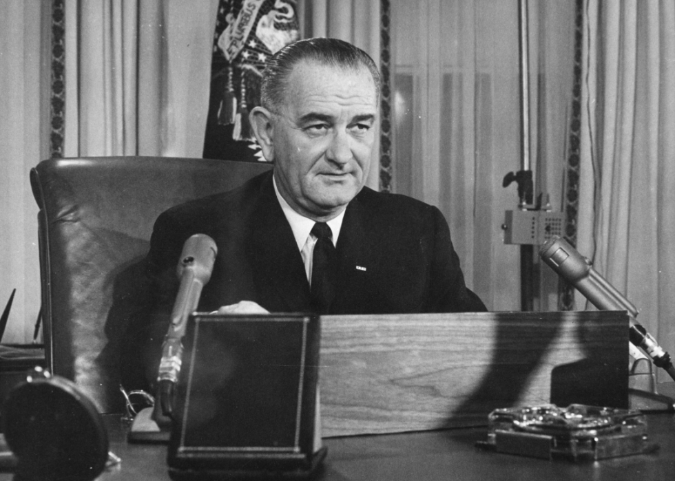 President Johnson addresses the nation on his first Thanksgiving Day television programme, broadcast from the executive offices of the White House, 1963.