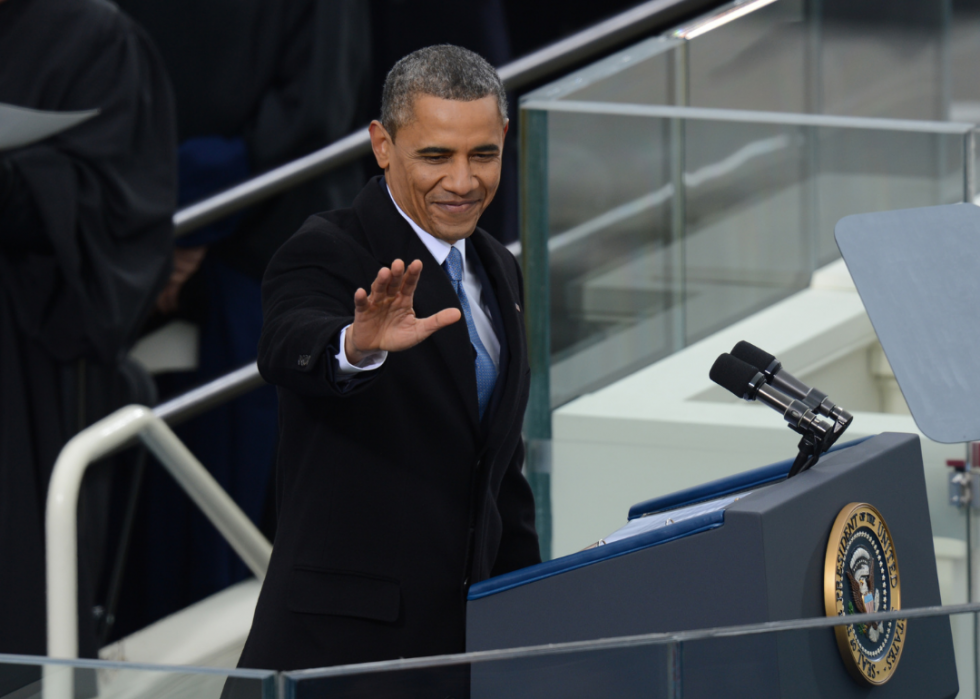 President Barack Obama waves after taking the oath of office.