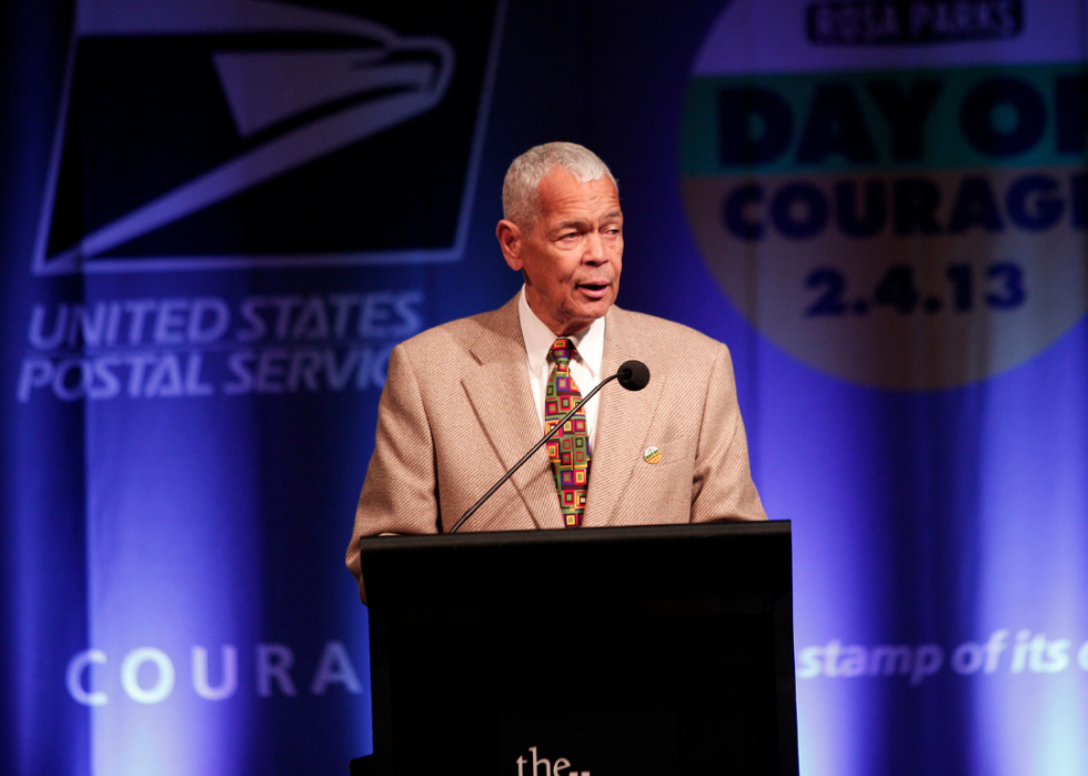 Julian Bond speaks during the unveiling of the new Rosa Parks stamp, 2013