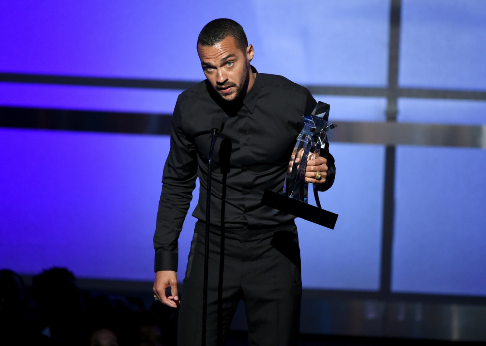 Jesse Williams accepts the Humanitarian Award onstage during the awards.