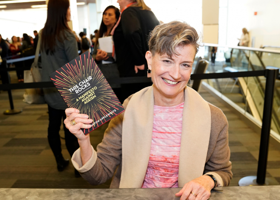 Ashton Apple presents her book, 'This Chair Rocks: A Manifesto Against Ageism,' during a 2020 conference.