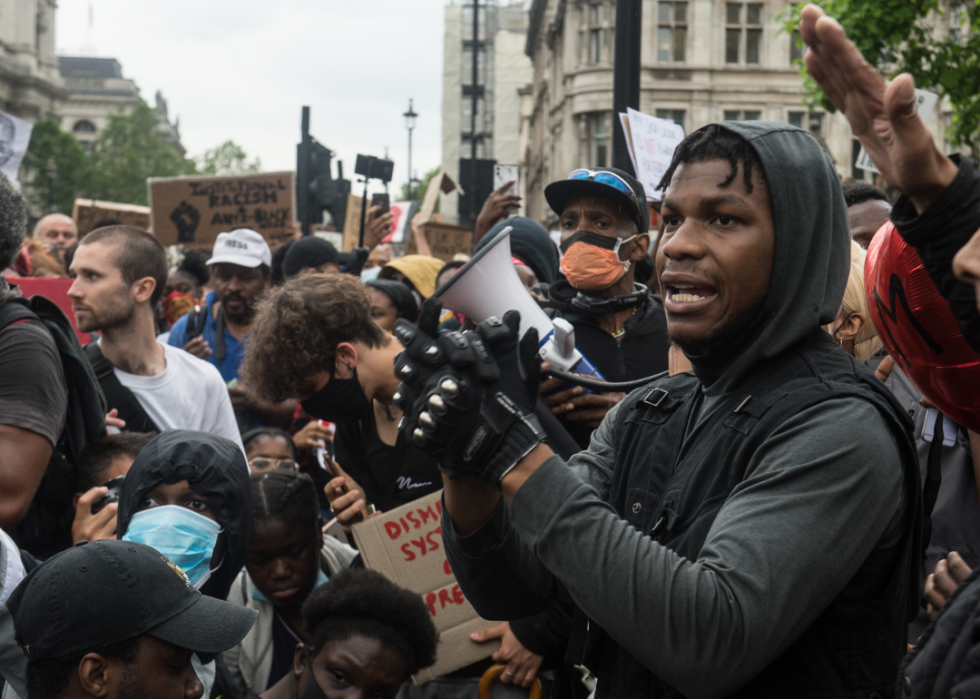 John Boyega speaks as protestors join a Black Lives Matter rally at Hyde Park before marching into central London and finishing at parliament square. 