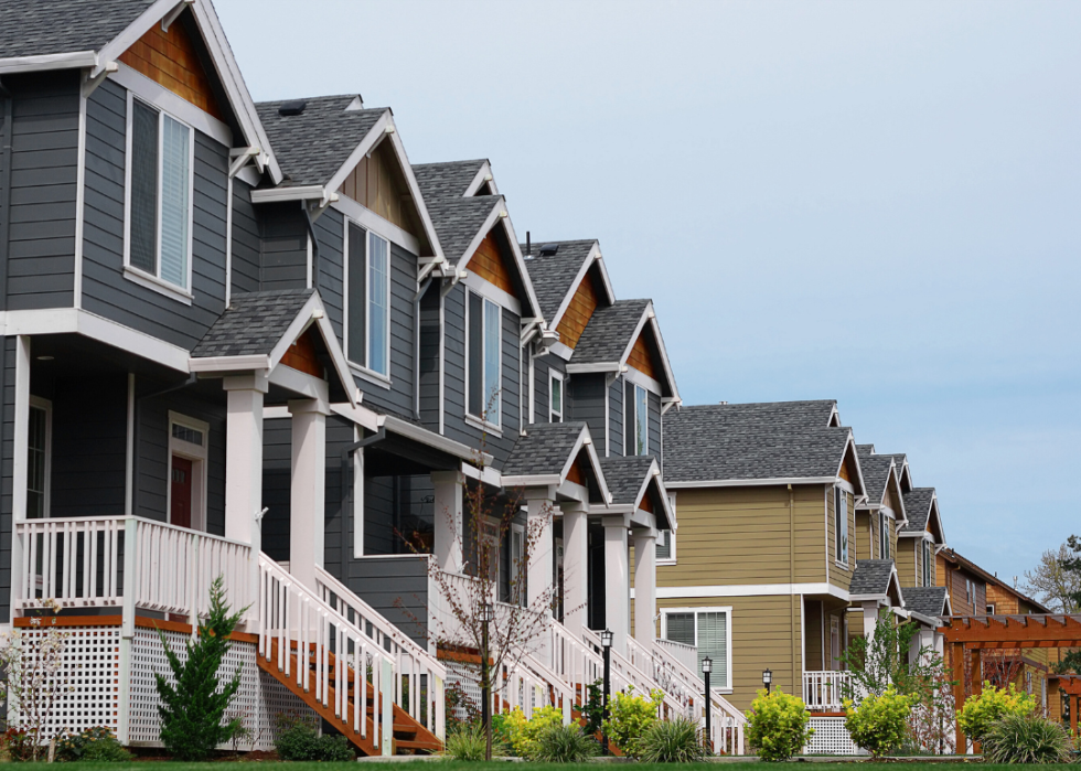 A row of modern, suburban homes in a residential neighborhood.