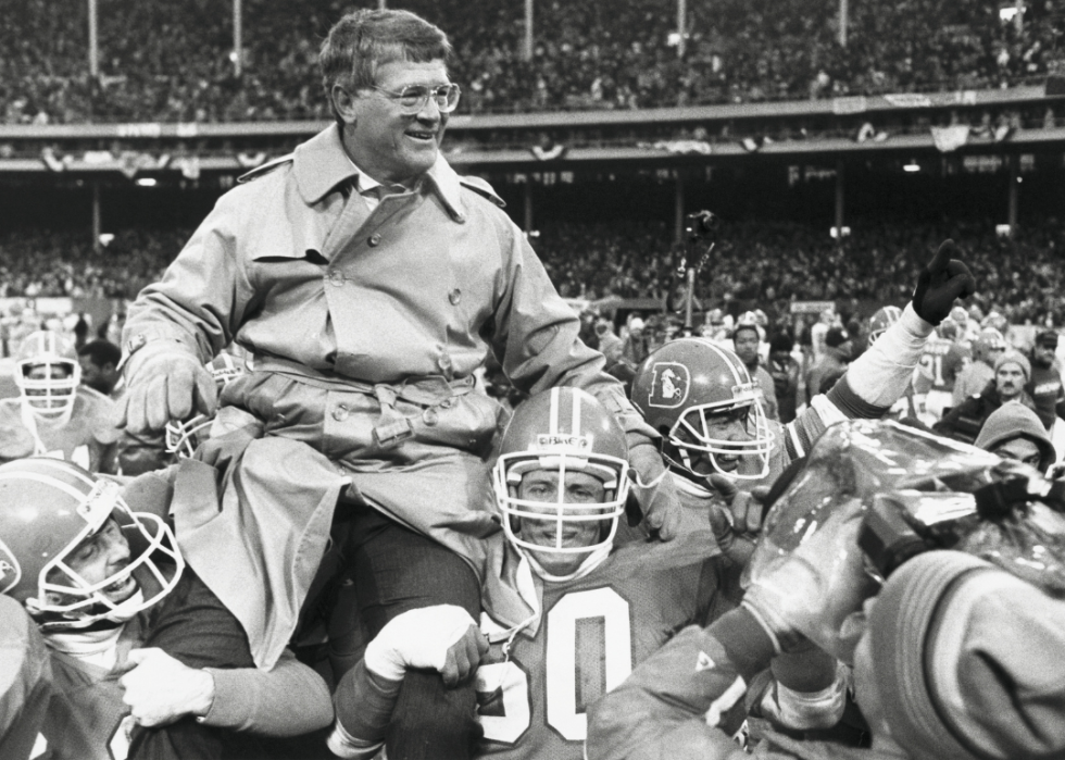 Dan Reeves being carried by players.