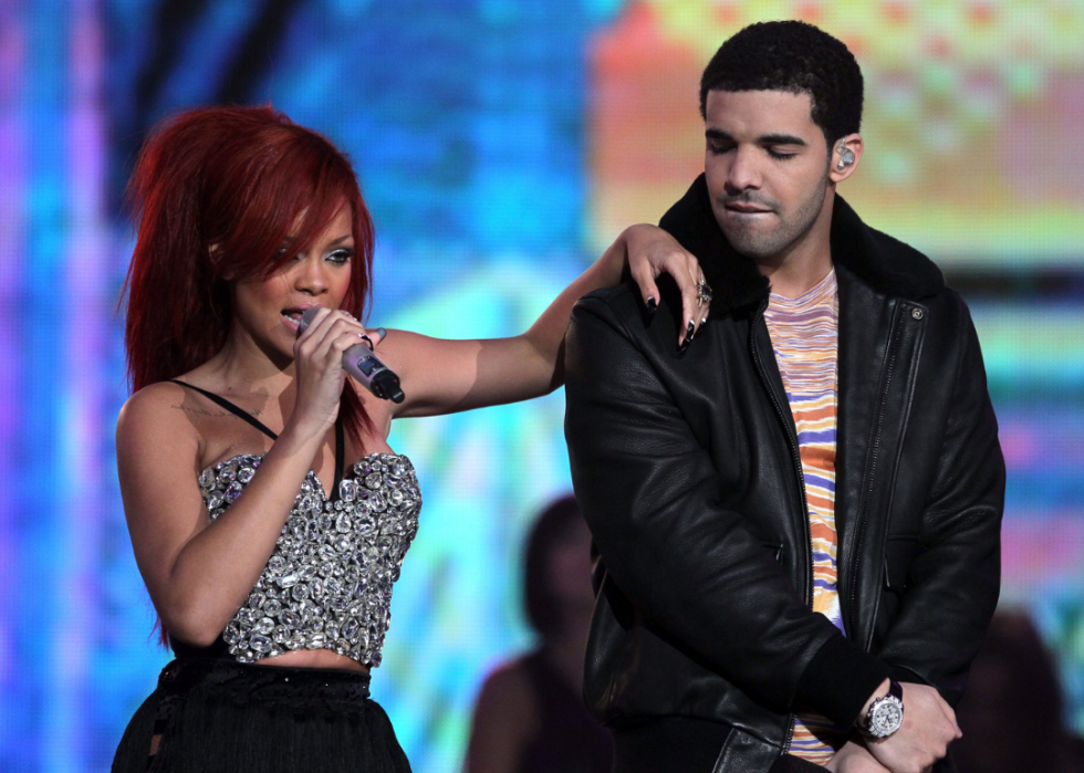 Rhianna and Drake onstage at event.