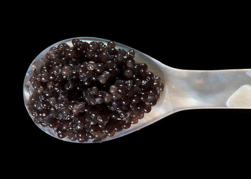 A spoon of caviar close-up.