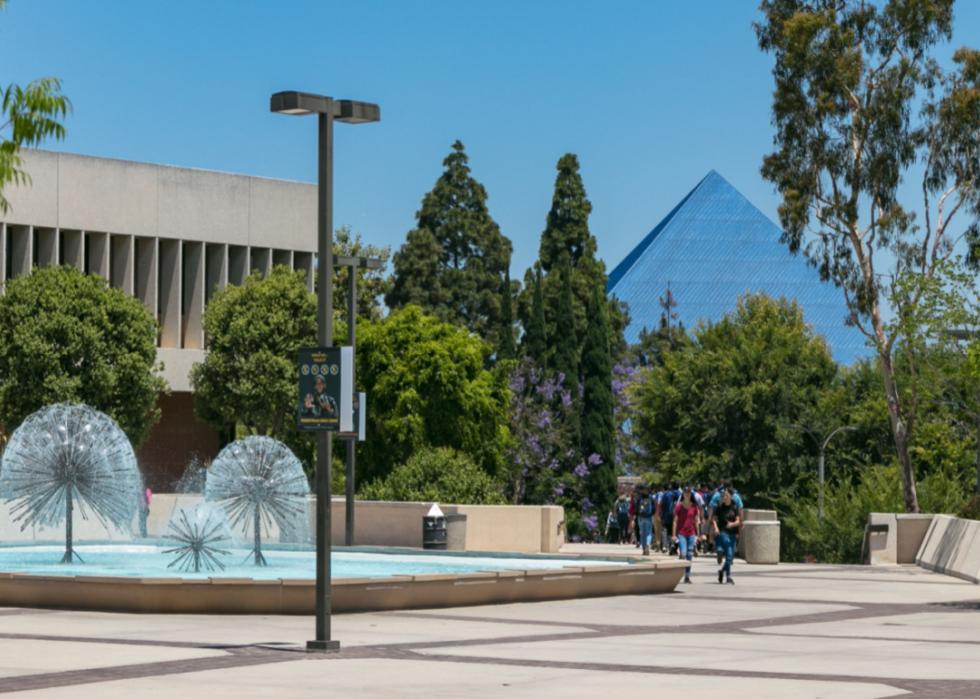 Students congregate by the fountains outside of the University of California, Long Beach.