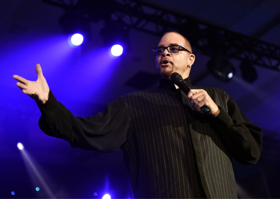 Sinbad performing onstage.